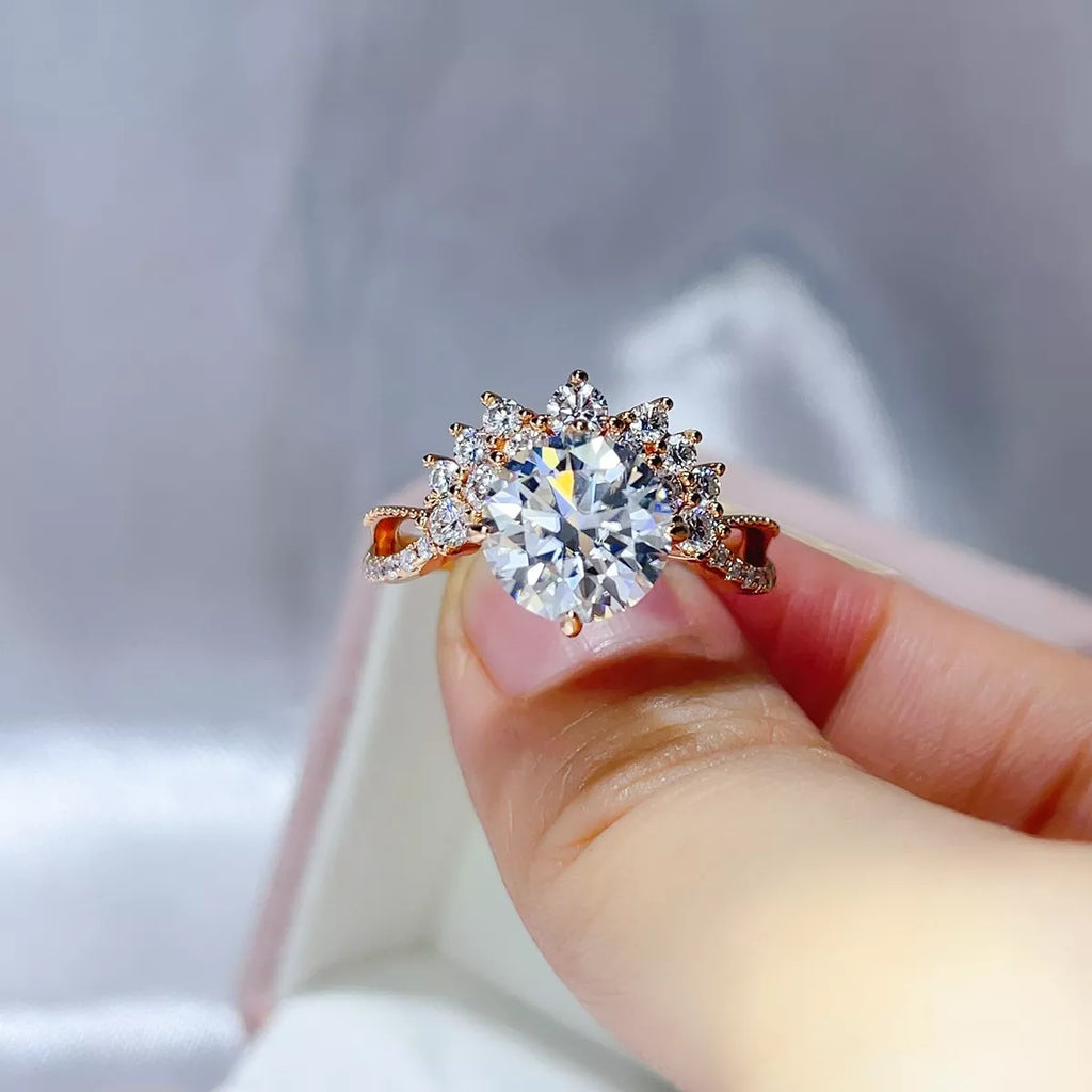 3 carat moissanite ring in sterling silver featuring a brilliant stone and intricate design, showcased in a hand-held display.
