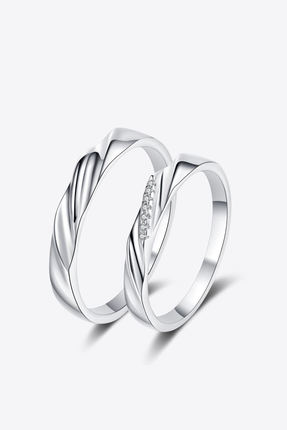 Minimalist 925 Sterling Silver Rhodium-Plated Ring featuring twisted designs and subtle shine.
