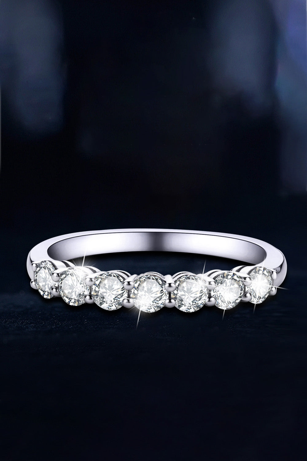Can't Stop Your Shine Moissanite Platinum-Plated Ring showcasing sparkling stones on a minimalist platinum band.