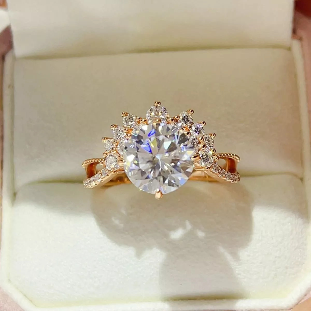 3 carat moissanite ring in sterling silver elegantly showcased on a soft cushion background.