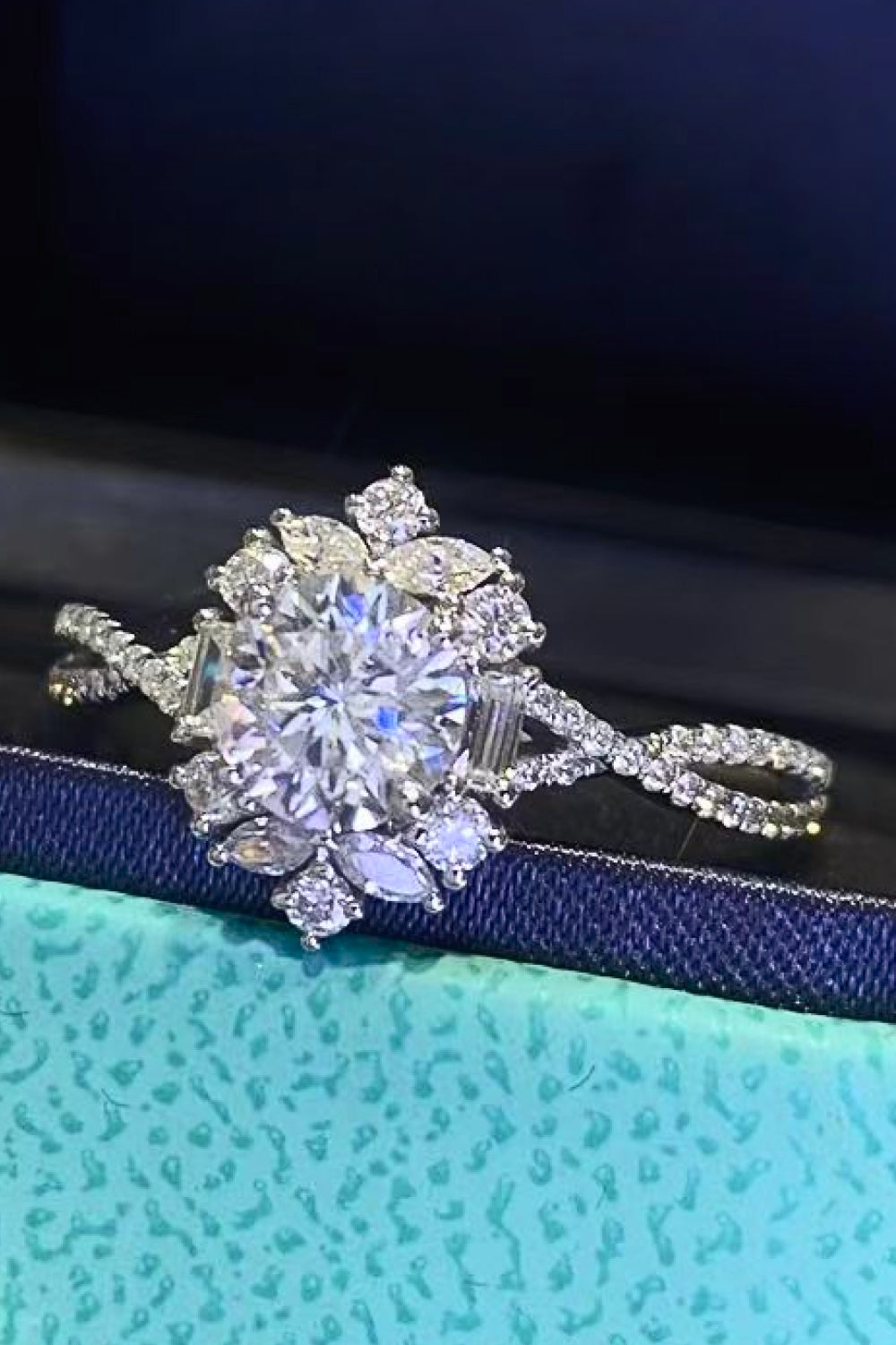 Floral 2 Carat Moissanite Crisscross Engagement Ring in elegant setting with sparkling stones