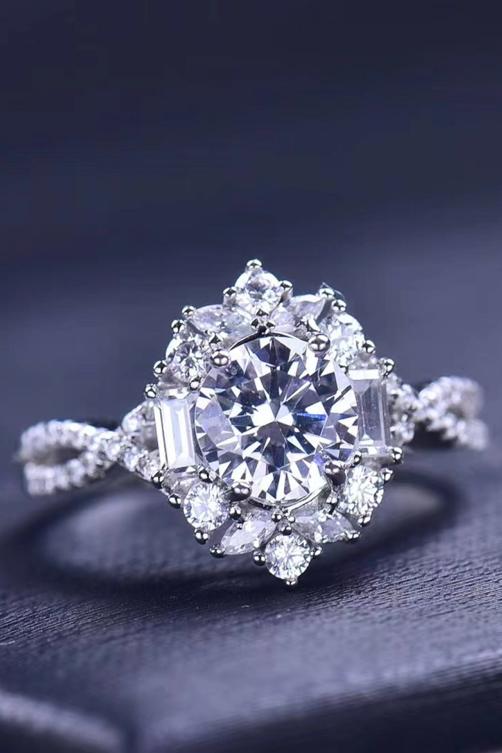 Floral 2 Carat Moissanite Crisscross Engagement Ring featuring a dazzling flower-inspired design with brilliant sparkle.