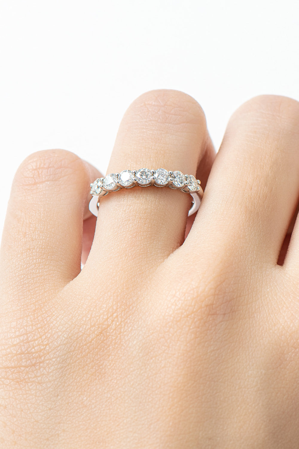 Can't Stop Your Shine Moissanite Platinum-Plated Ring on a finger showcasing its sparkling design.