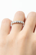 Can't Stop Your Shine Moissanite Platinum-Plated Ring on a finger showcasing its sparkling design.