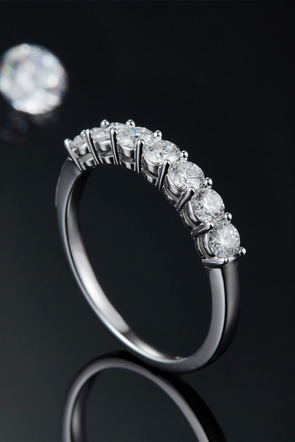 Can't Stop Your Shine Moissanite Platinum-Plated Ring showcasing sparkling stones on a sleek band.